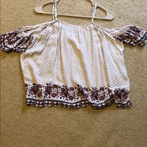 A white and purple off the should top